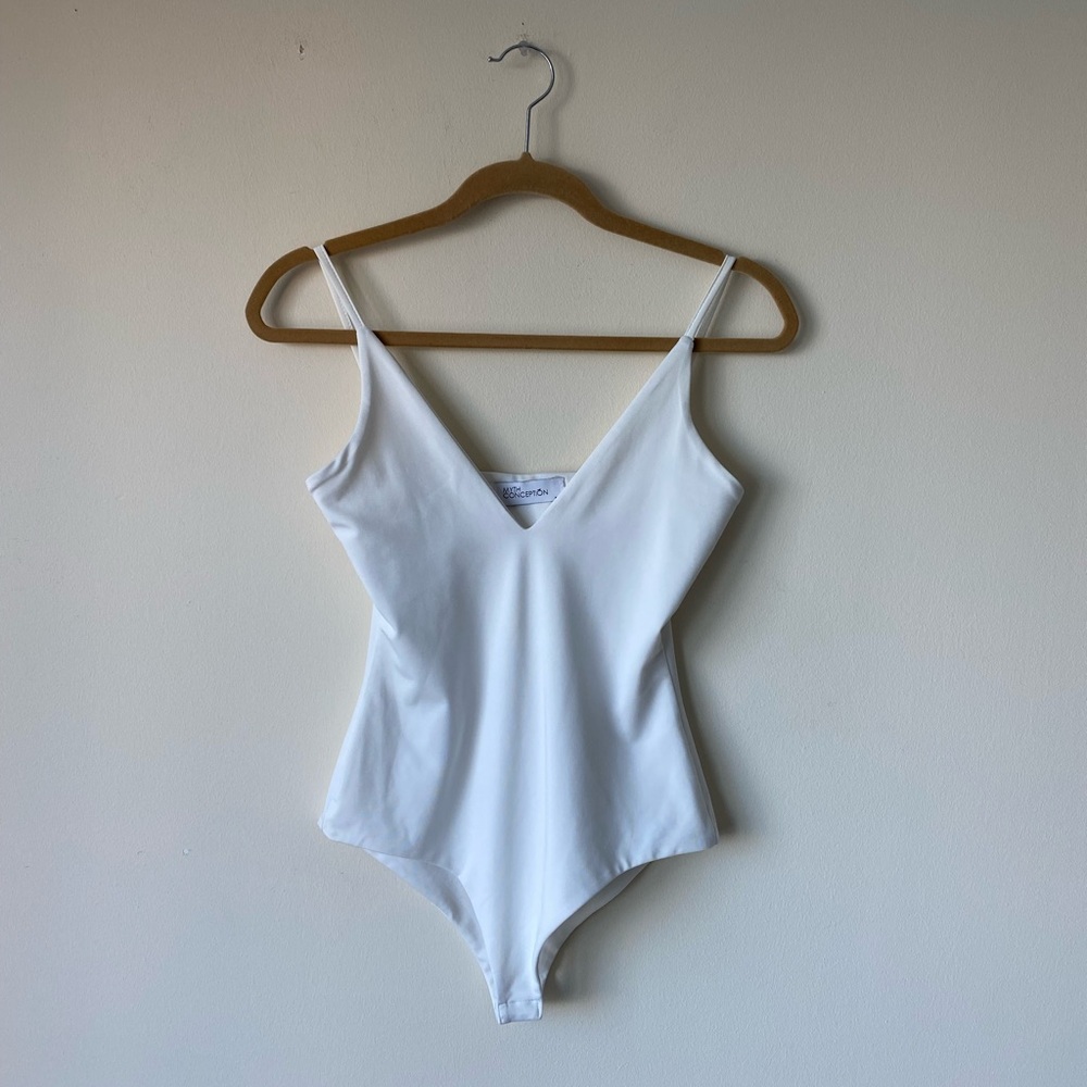 White Bodysuit with Spaghetti Straps and Deep V-Neckline
